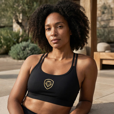 Women's Lion Shield Black and Gold Strappy Sports Bra