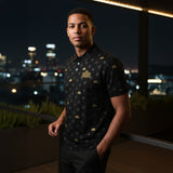 Future Looks Bright Royal Crest Allover Print Black and Gold Polo